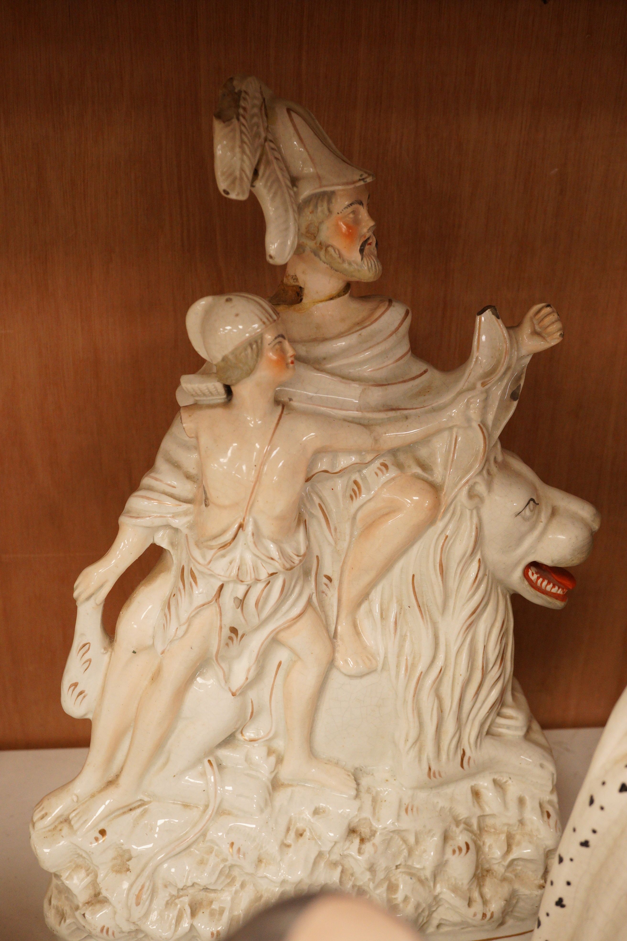 A group of Staffordshire pottery groups, tallest 38cm